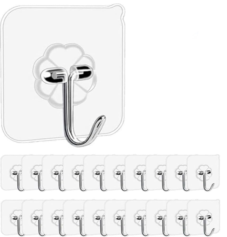 Set of metal hooks with adhesive backing on a white background
