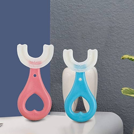Two dental tools, one pink and one blue, on a gray surface with a blue and gray background.