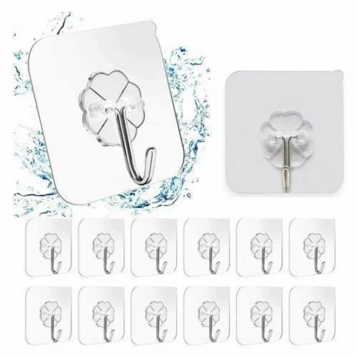 Set of transparent adhesive hooks with water splash effect on a white background
